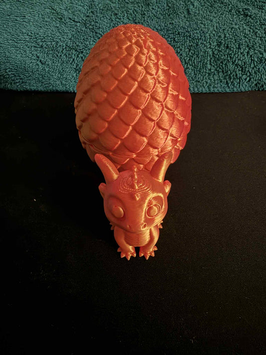 Small Egg with hatchling